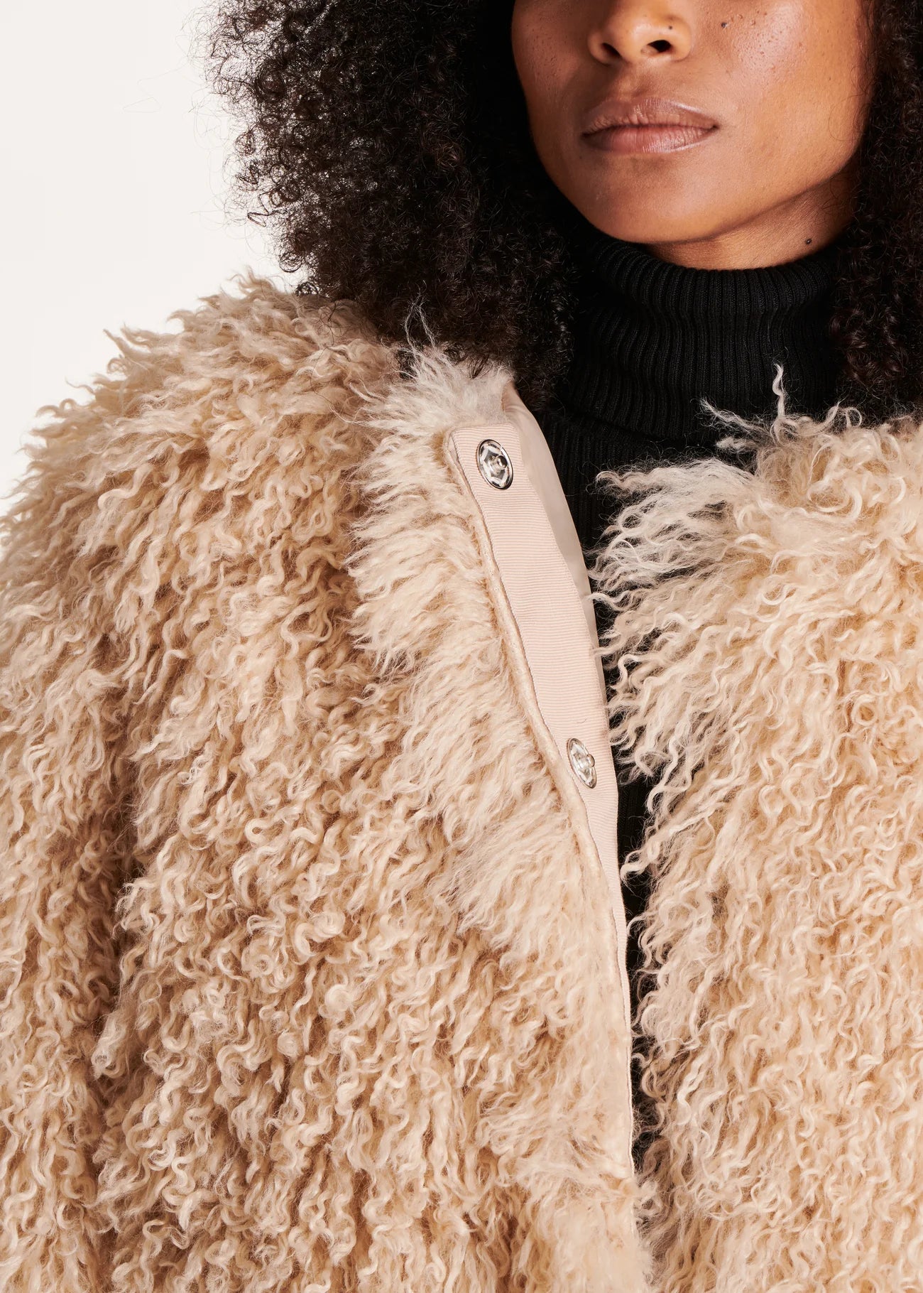 Zarina Faux Shearling Coat - womenÕs cropped beige faux shearling jacket with snap-button closure.