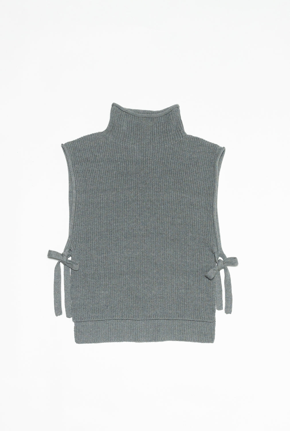 Flatlay image of a grey sleeveless turtleneck sweater with a ribbed texture and side ties, displayed on a white background.